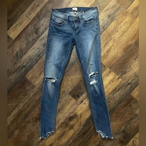 Women’s Sneak Peek distressed skinnies